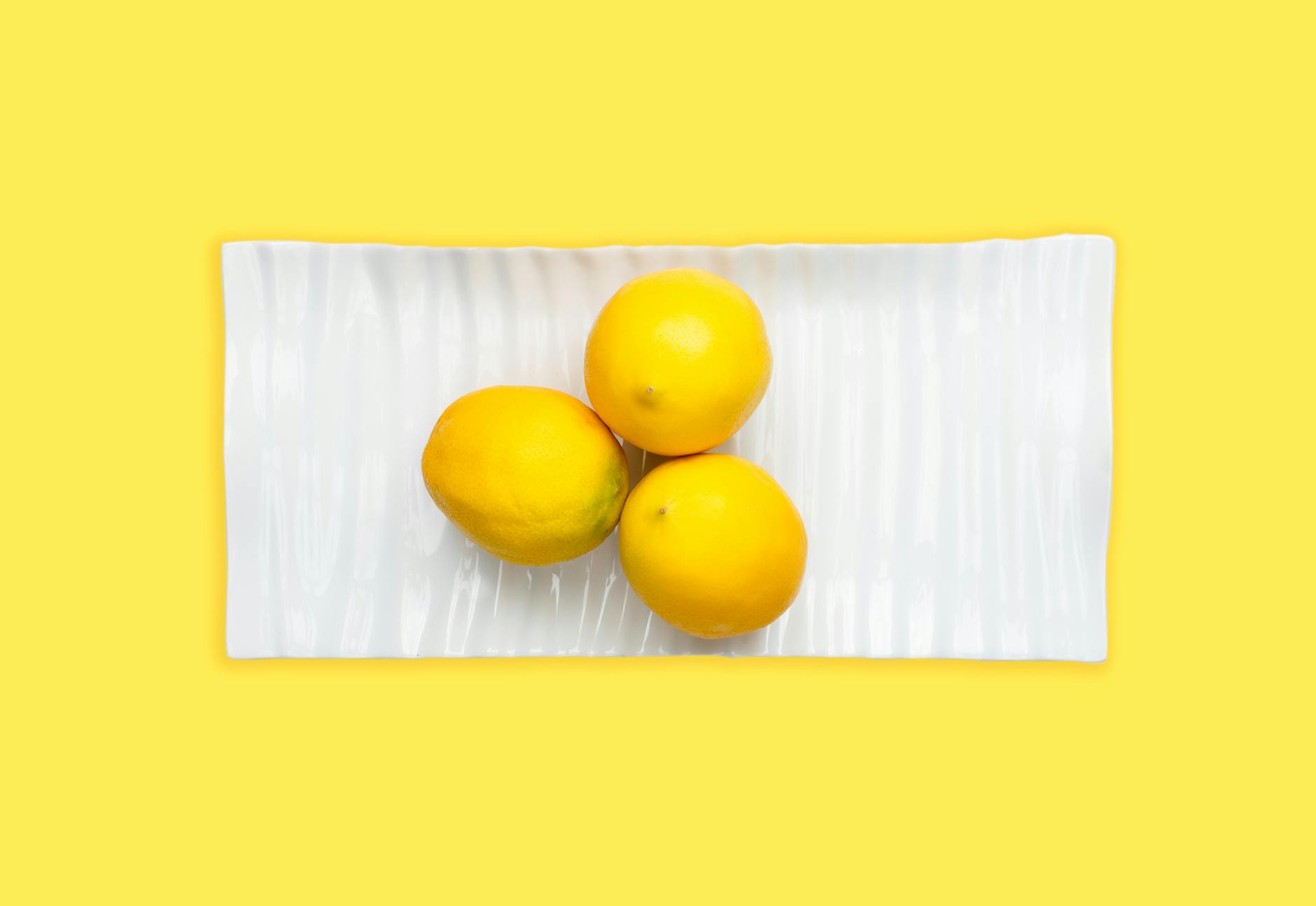 Woman holding lemon vibrators with confidence and intention